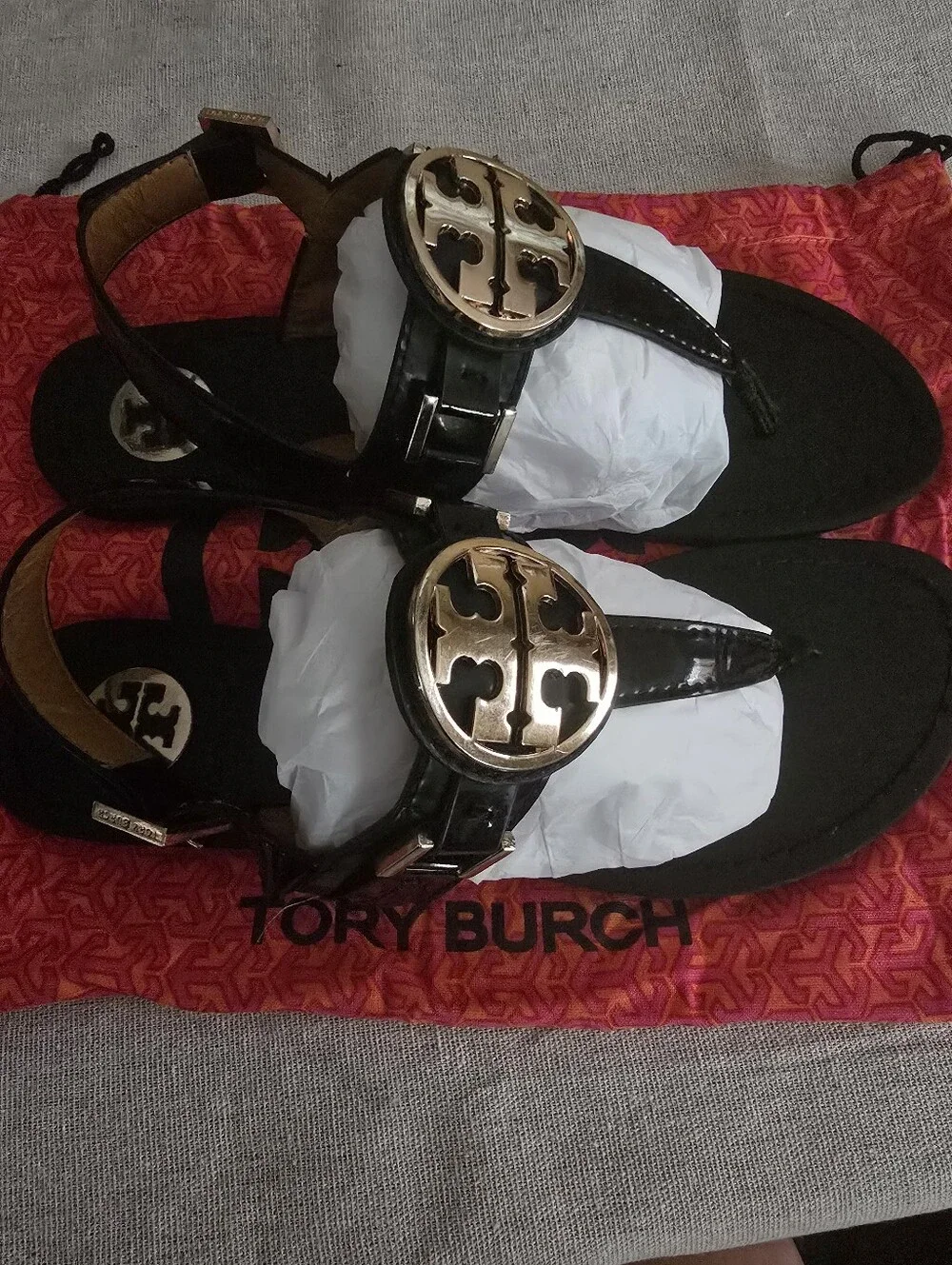 Tory Burch Black Patent Leather Thong Sandals with Gold Logo Medallions